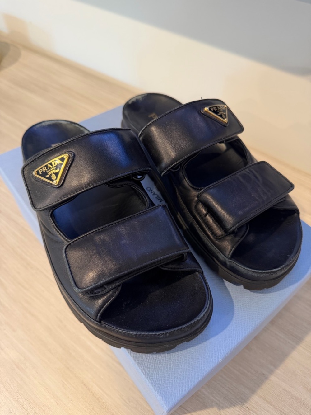 Prada Black Leather Double-Strap Slide Sandals with Gold Logo